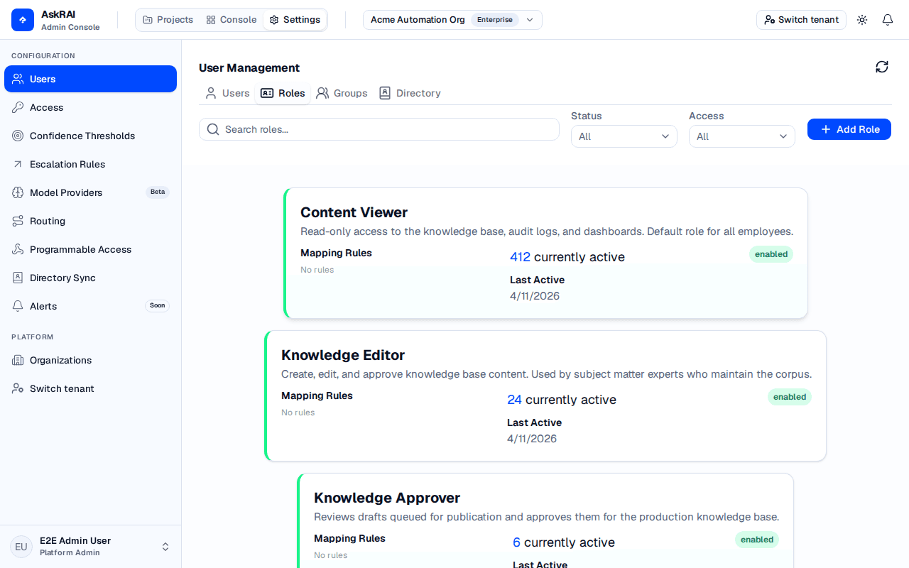 Roles tab showing role cards with mapping rules, active users, and status